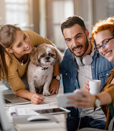 Busy family with their dog at home
